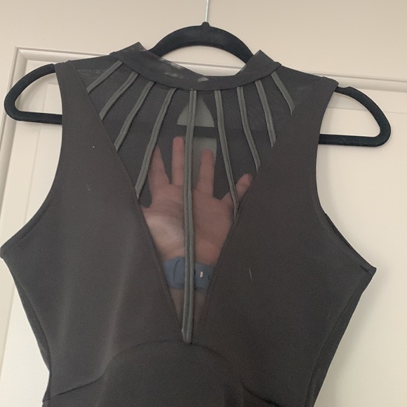 Black Peplum Top with Sheer Front - Picture 2 of 5